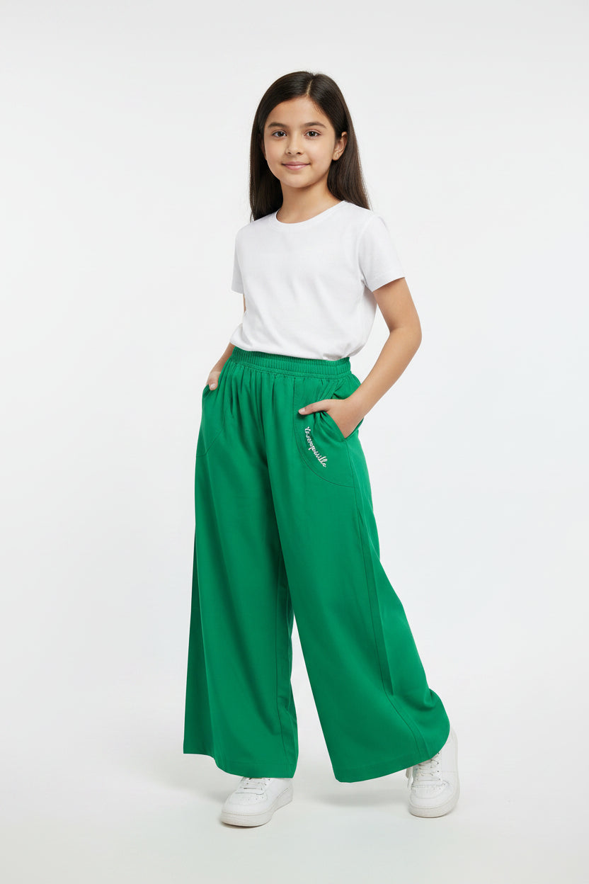Green women's trousers feature a wide-leg design